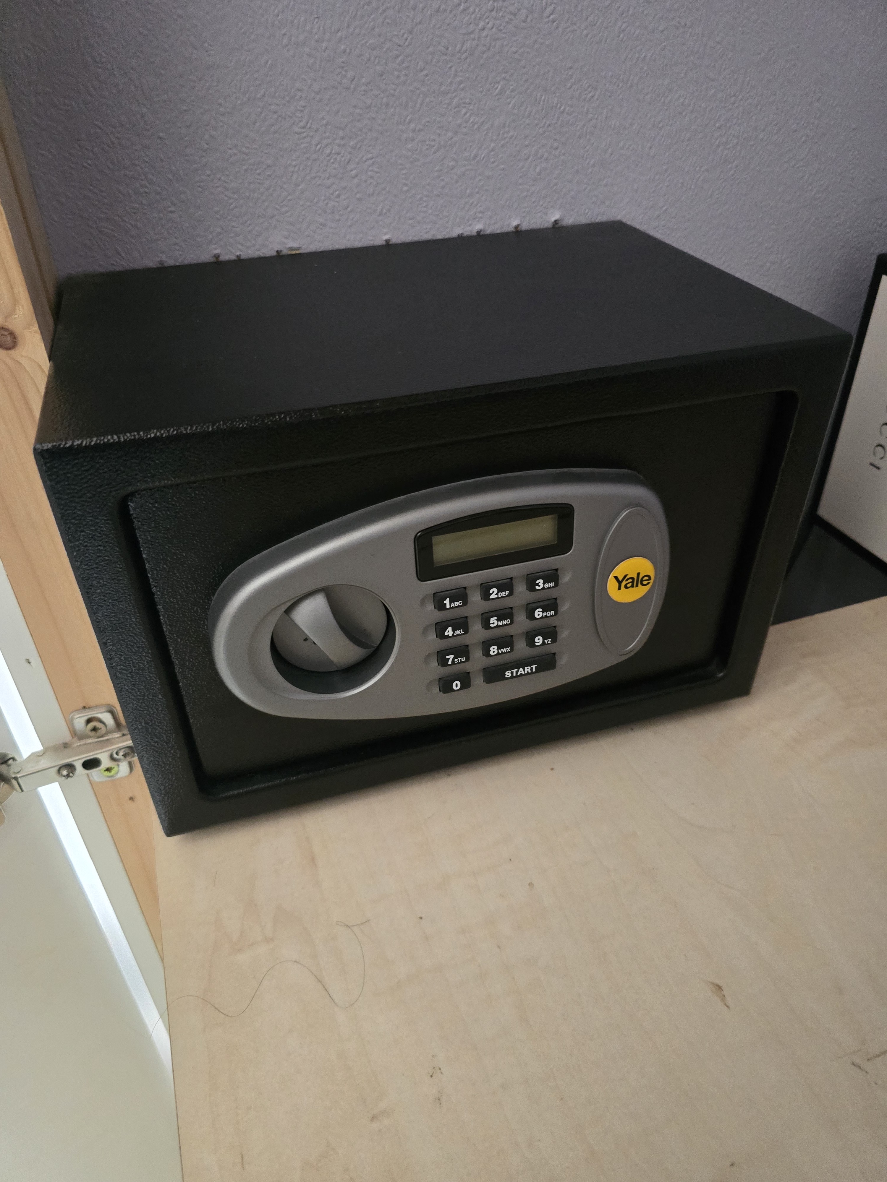 Yale digital home safe installed and bolted down